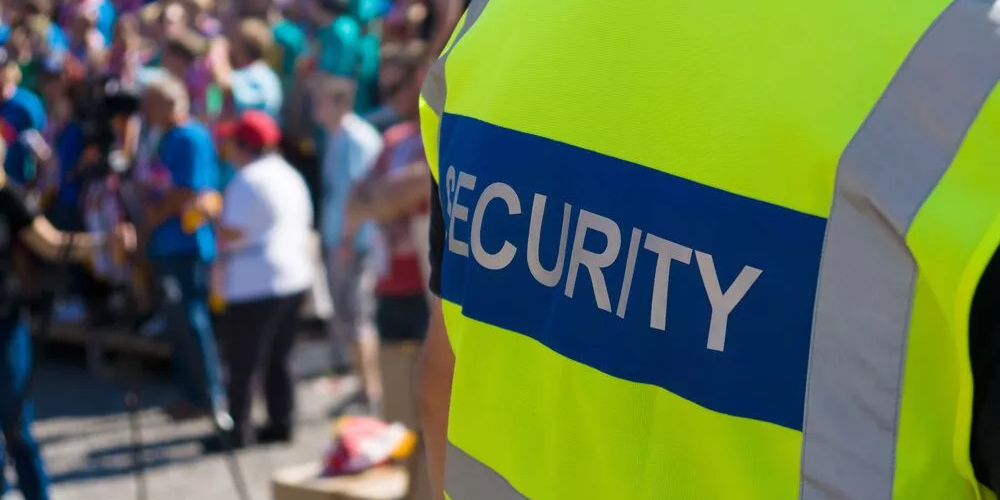 Professional Alert Security guard providing security services for an event in UK