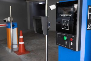 Entrance to a secure car park with cctv cameras and security barriers